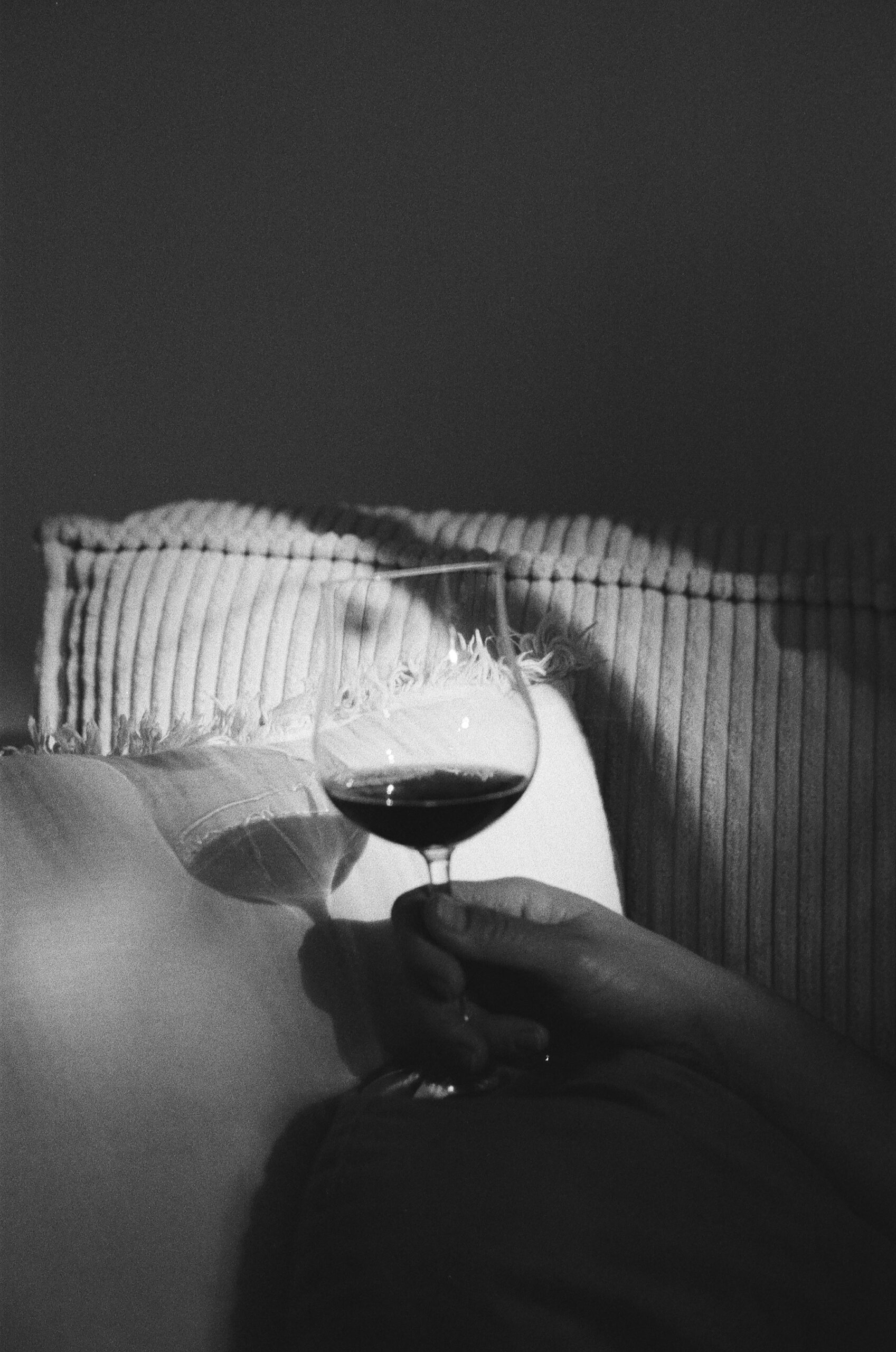 A glass of wine in black and white, on film camera